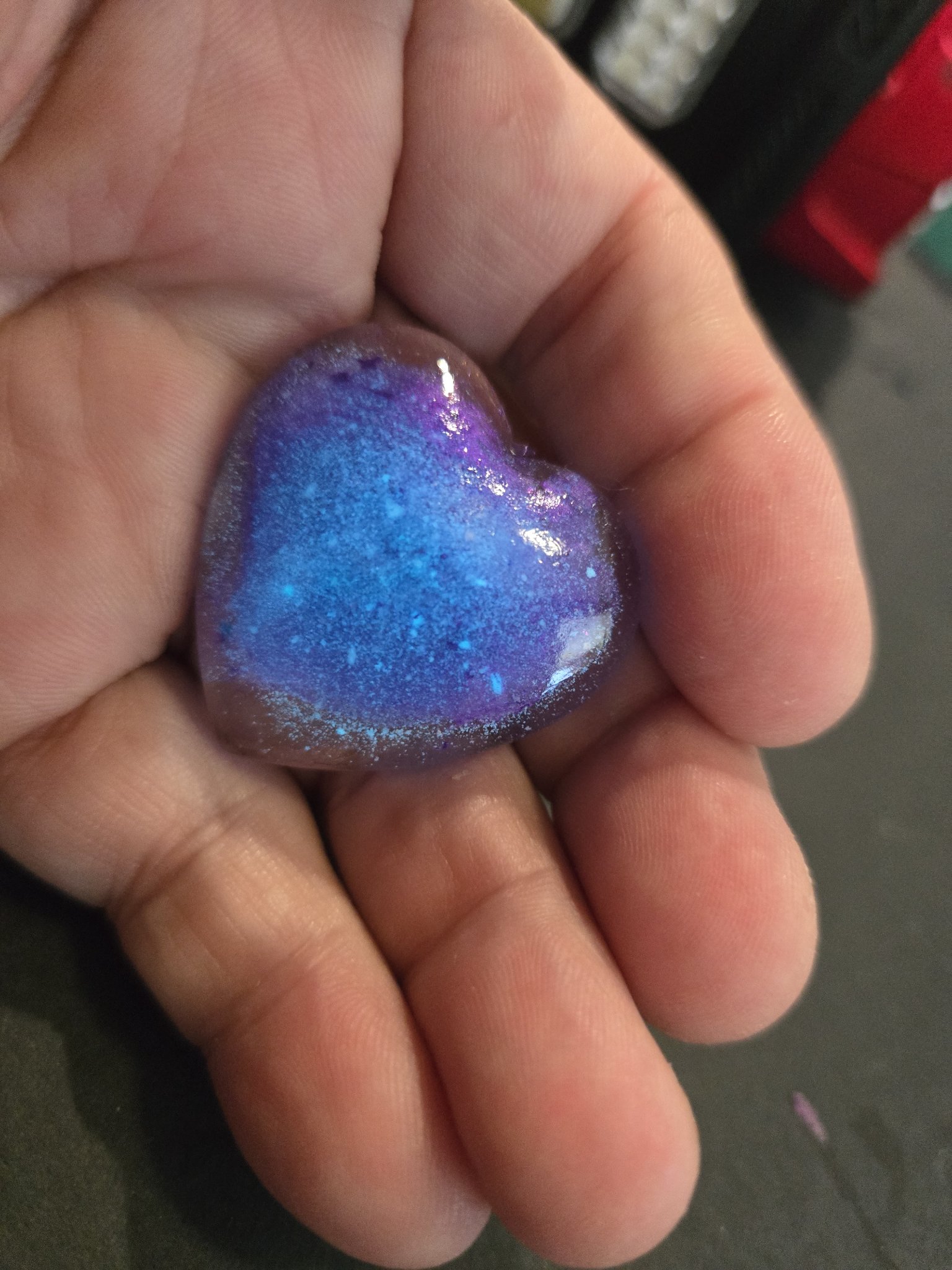 Stock 197 purple and blue heart-shaped resin pendant in normal light
