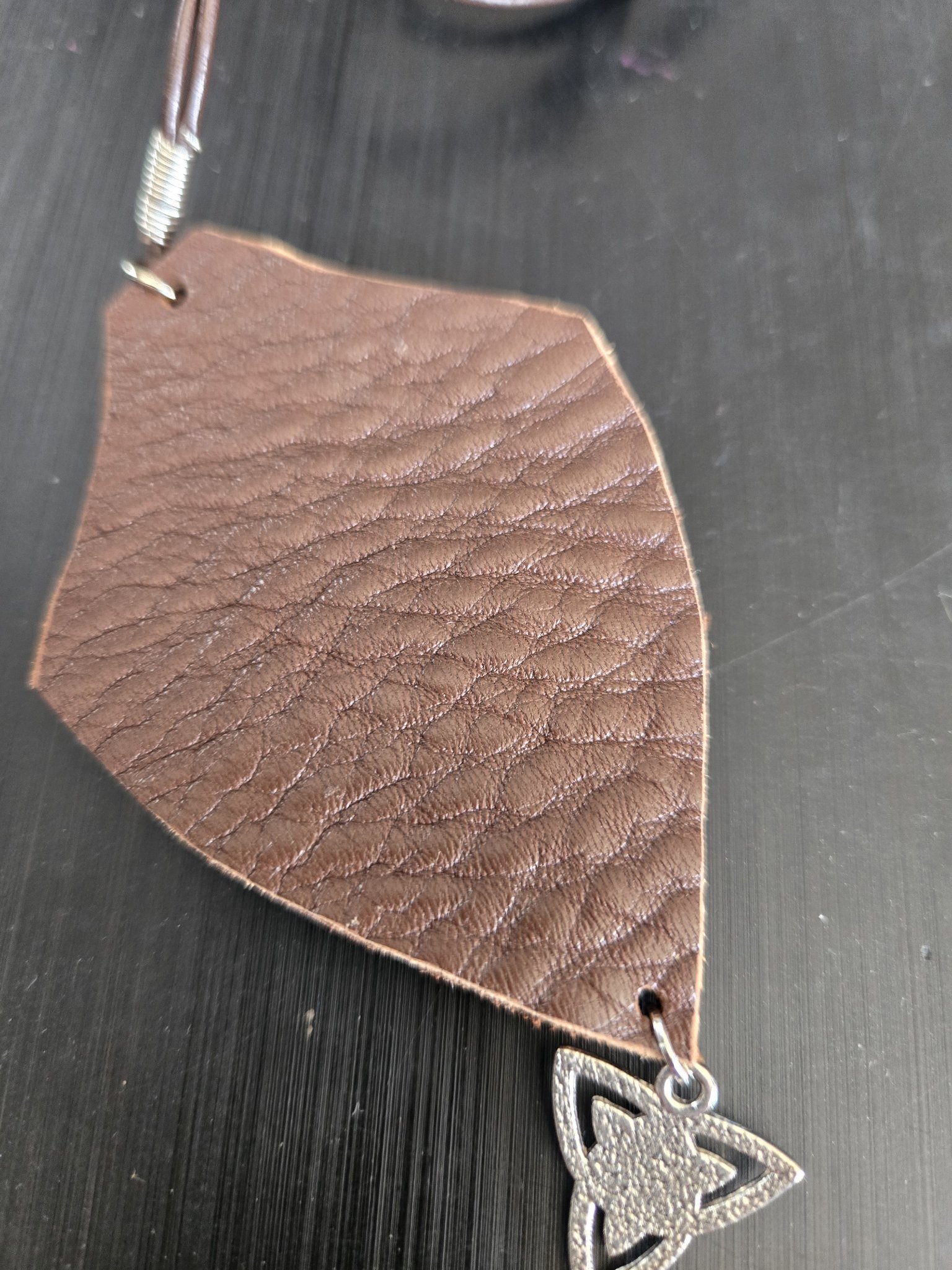 Plain leather back of stock 175 buffalo leather Celtic shield pendant