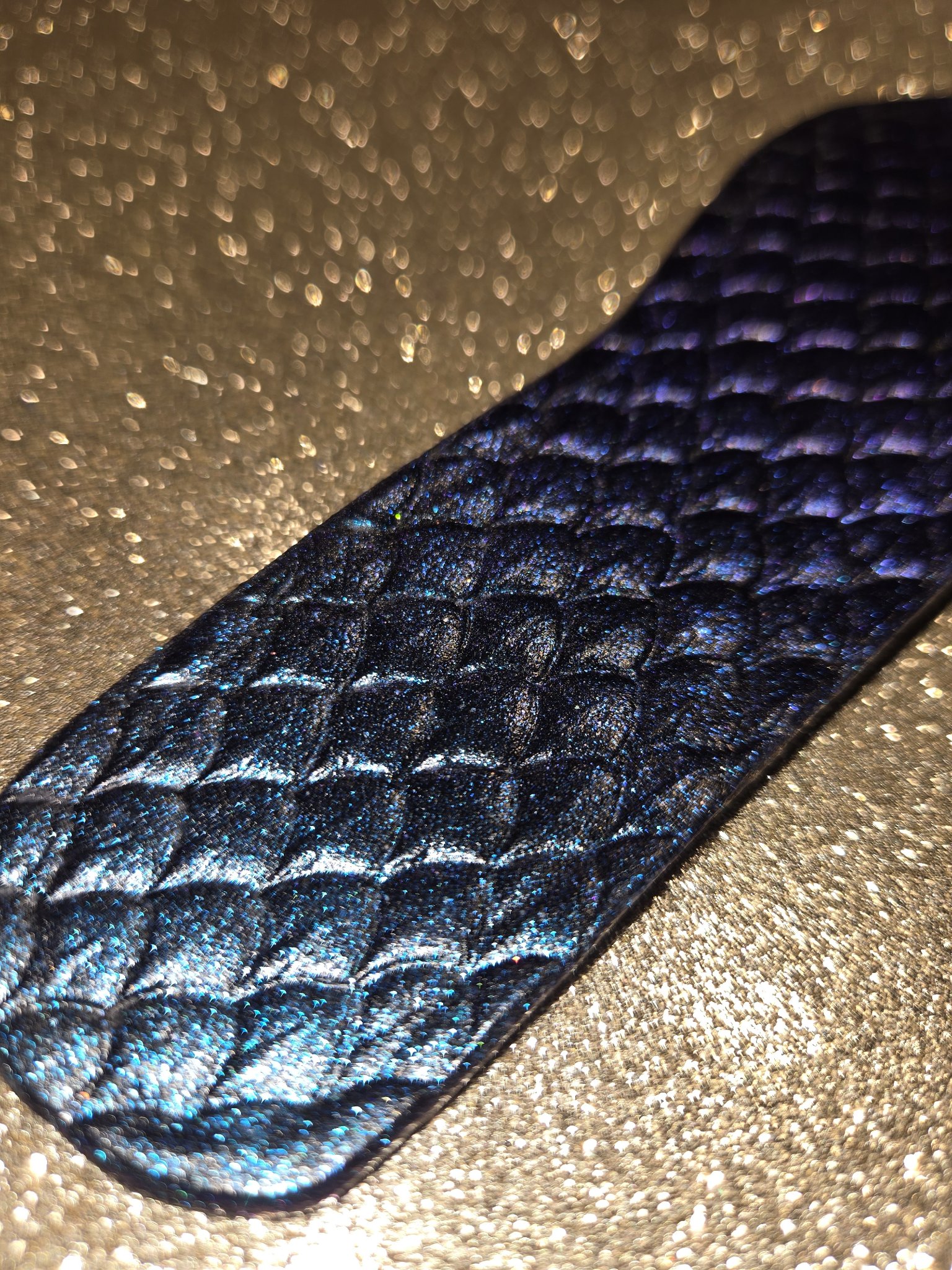 Alternate detail of the color-shifting dragon scale pattern on stock 213 leather cuff