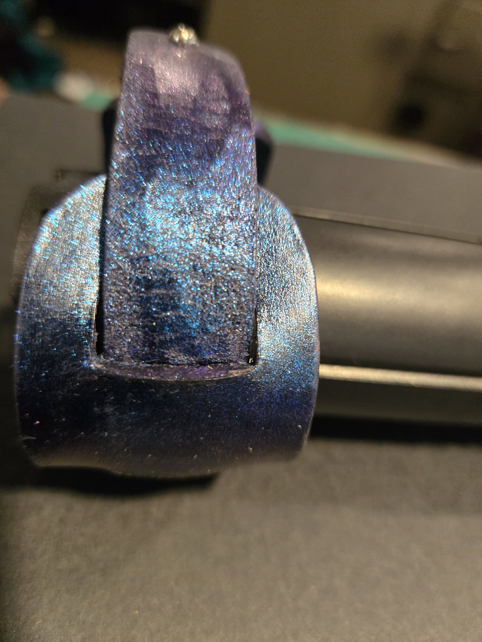 Alternate standing view of stock 216 showing the blue and purple finish