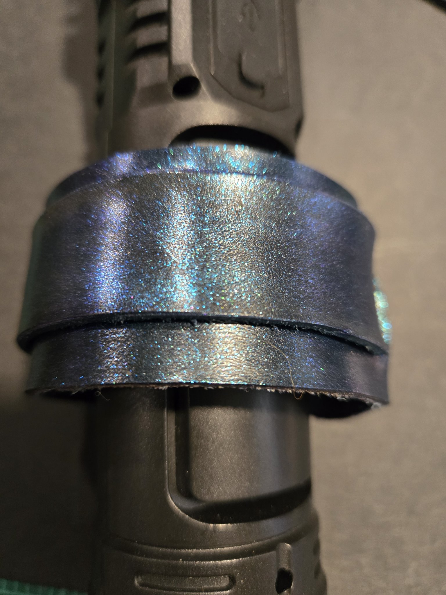 Stock 224 on display showing its blue and purple color shift