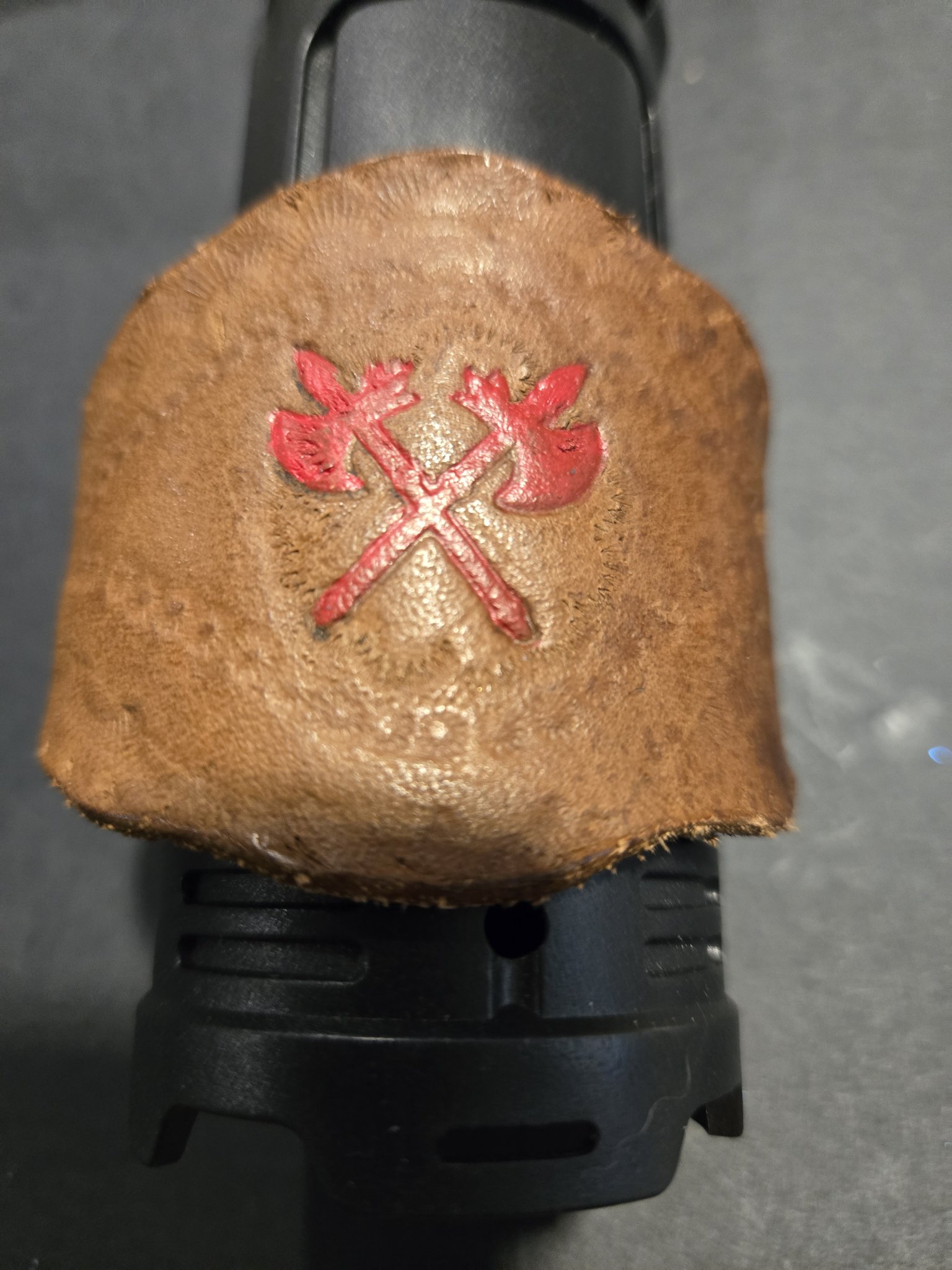 Stock 230 on display showing the red crossed axes design