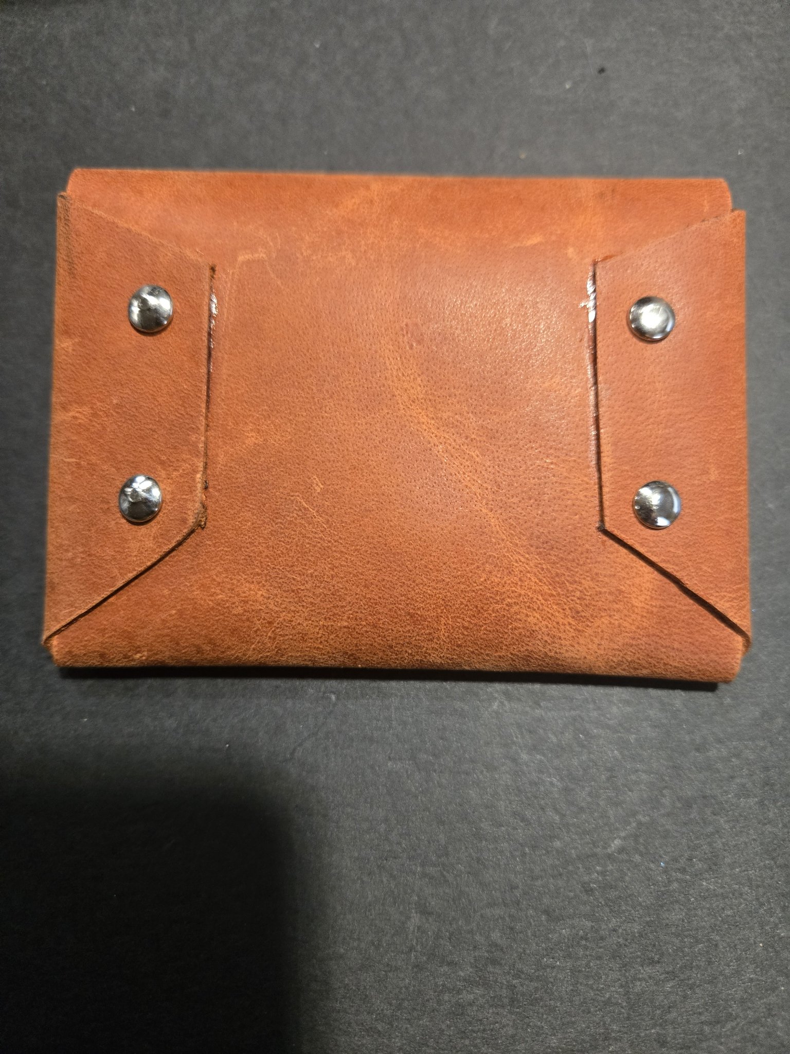 Back of stock 242 showing the riveted sides with silver-tone rivets