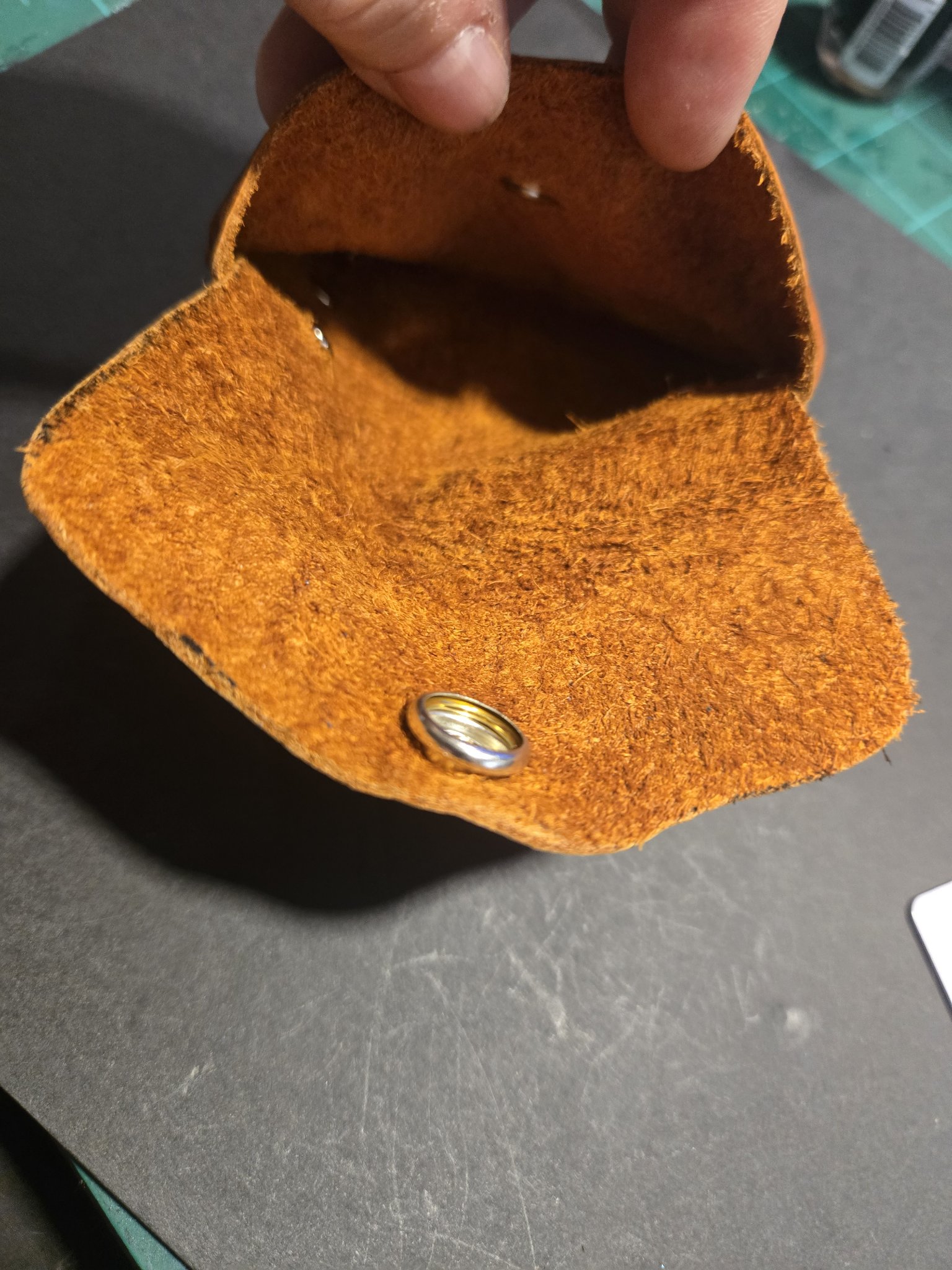 Stock 243 held open showing the soft suede interior